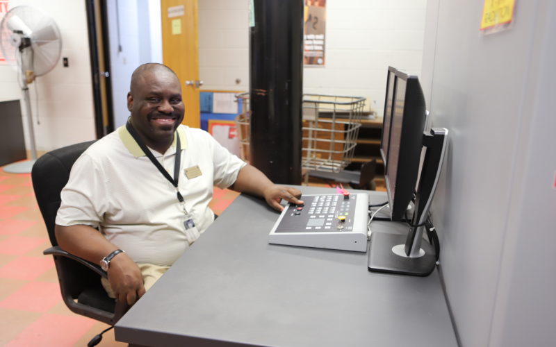 Man works on computer to find employment