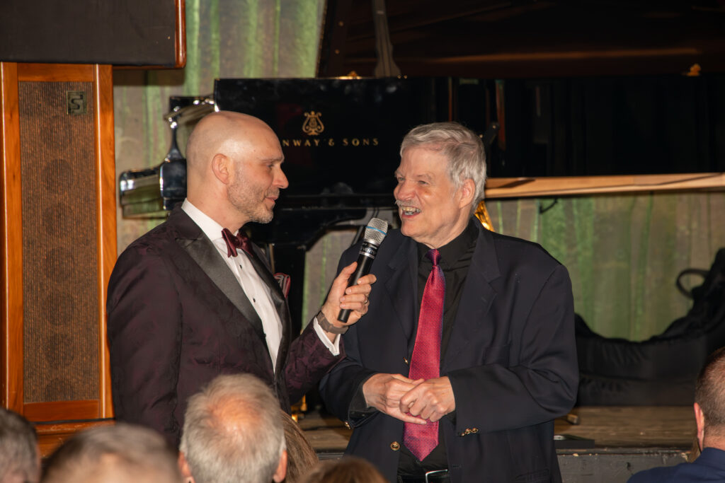 Man speaks into a microphone